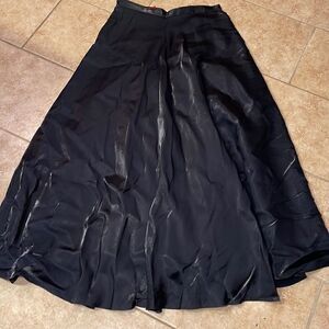 Black long maxi skirt with attached mesh slip.